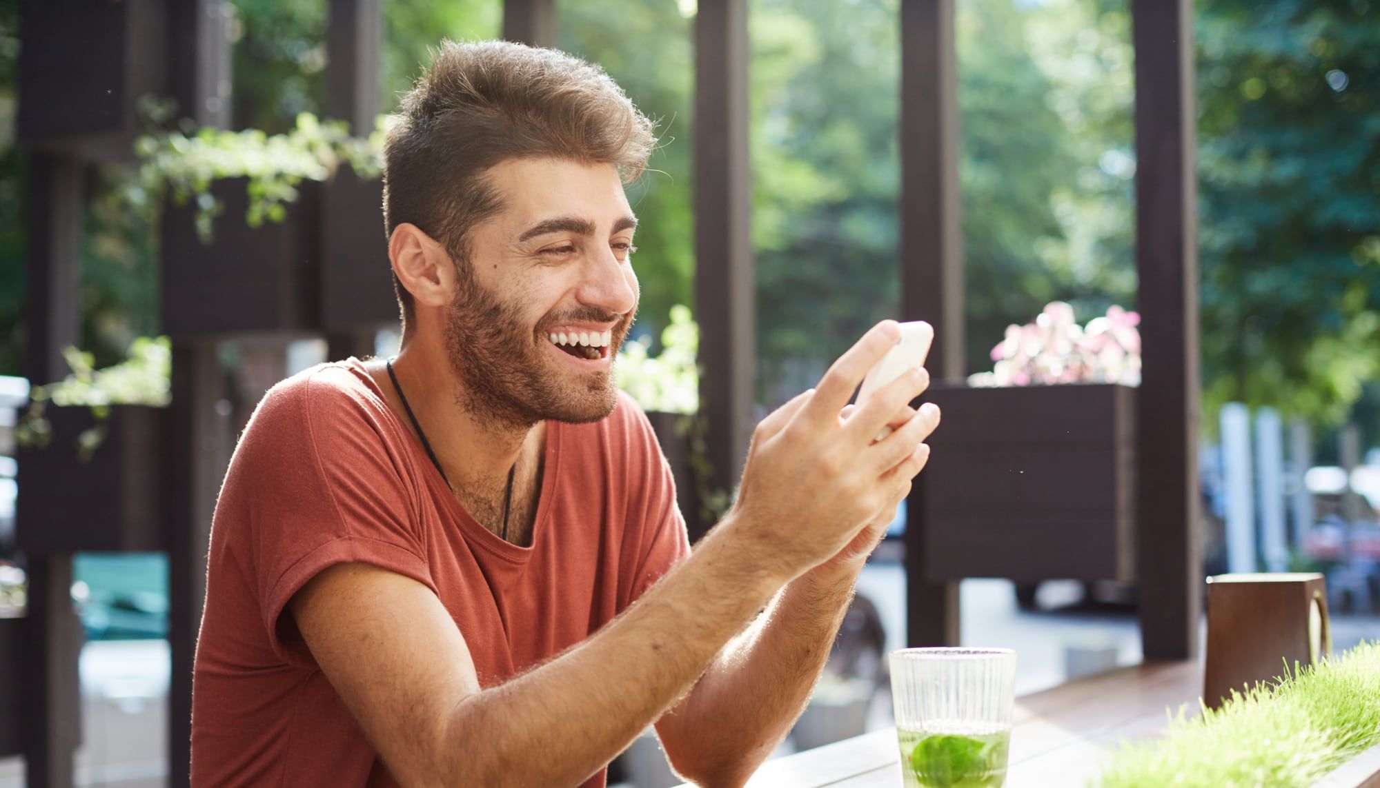 Entrepreneur with a phone in a café