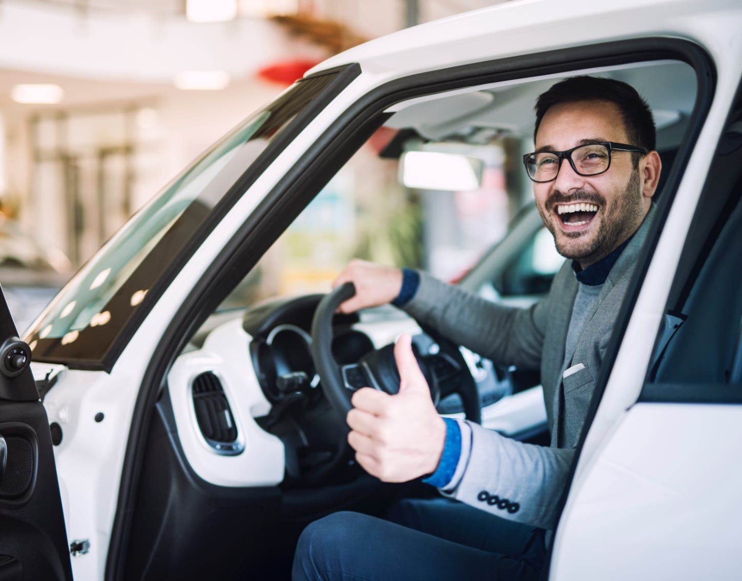Customer in a new car